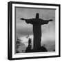 Women Posing with the Statue Called "Christ the Redeemer"-Hart Preston-Framed Premium Photographic Print