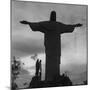 Women Posing with the Statue Called "Christ the Redeemer"-Hart Preston-Mounted Premium Photographic Print