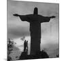 Women Posing with the Statue Called "Christ the Redeemer"-Hart Preston-Mounted Premium Photographic Print