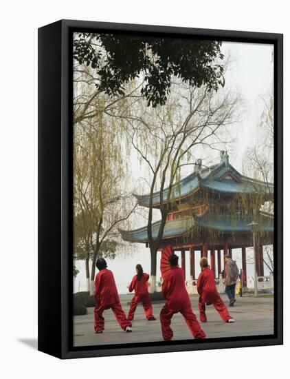 Women Practising Tai Chi in Front of a Pavilion on West Lake, Hangzhou, Zhejiang Province, China-Kober Christian-Framed Stretched Canvas