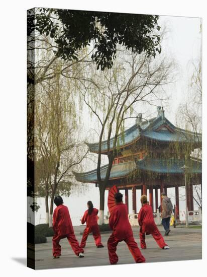 Women Practising Tai Chi in Front of a Pavilion on West Lake, Hangzhou, Zhejiang Province, China-Kober Christian-Stretched Canvas