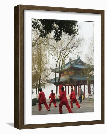 Women Practising Tai Chi in Front of a Pavilion on West Lake, Hangzhou, Zhejiang Province, China-Kober Christian-Framed Photographic Print