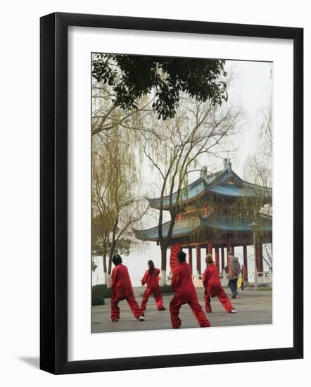 Women Practising Tai Chi in Front of a Pavilion on West Lake, Hangzhou, Zhejiang Province, China-Kober Christian-Framed Photographic Print