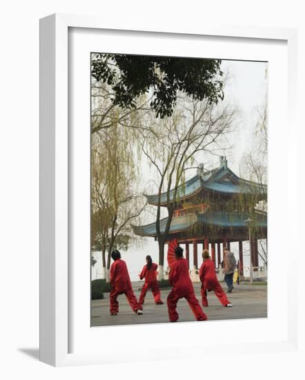 Women Practising Tai Chi in Front of a Pavilion on West Lake, Hangzhou, Zhejiang Province, China-Kober Christian-Framed Photographic Print