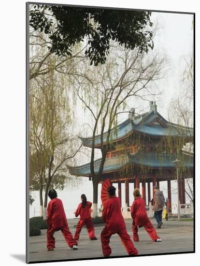 Women Practising Tai Chi in Front of a Pavilion on West Lake, Hangzhou, Zhejiang Province, China-Kober Christian-Mounted Photographic Print
