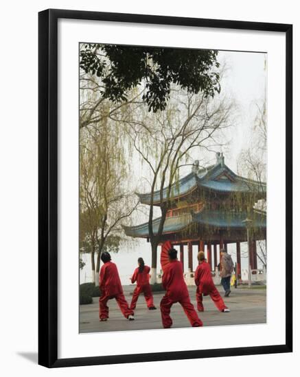 Women Practising Tai Chi in Front of a Pavilion on West Lake, Hangzhou, Zhejiang Province, China-Kober Christian-Framed Photographic Print