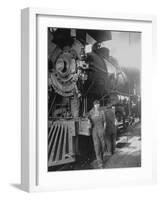 Women Rail Workers Standing at Work on Engine of Train, During WWI at Great Northern Railway-null-Framed Photographic Print