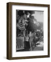 Women Rail Workers Standing at Work on Engine of Train, During WWI at Great Northern Railway-null-Framed Photographic Print