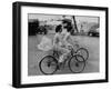 Women Riding Bicycles in Saigon-John Dominis-Framed Photographic Print