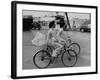 Women Riding Bicycles in Saigon-John Dominis-Framed Photographic Print