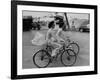 Women Riding Bicycles in Saigon-John Dominis-Framed Photographic Print