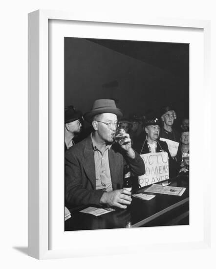 Women's Christian Temperance Union Members Raiding Local Bar Carrying Signs-Peter Stackpole-Framed Photographic Print