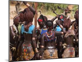 Women Sing and Dance Before the Bull Jumping, Turmi, Ethiopia-Jane Sweeney-Mounted Photographic Print