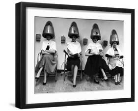 Women Sitting and Reading under Hairdryers at Rockefeller Center "Pamper Club"-Nina Leen-Framed Photographic Print