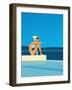 Women Sitting by Swimming Pool near Ocean-null-Framed Giclee Print