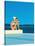 Women Sitting by Swimming Pool near Ocean-null-Stretched Canvas