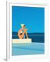 Women Sitting by Swimming Pool near Ocean-null-Framed Giclee Print