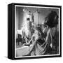 Women Sitting under Hair Dryers at the Hairdressers-Henry Grant-Framed Stretched Canvas