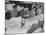 Women Sorting Clean Linens in Laundry Room at the Waldorf Astoria Hotel-null-Mounted Photographic Print