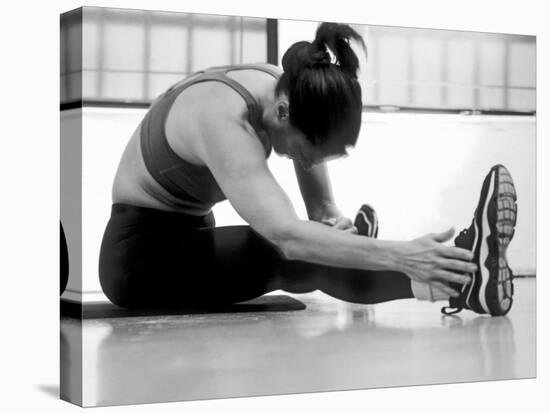 Women Stretching During Exercise Session, New York, New York, USA-Paul Sutton-Stretched Canvas