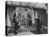 Women Trying on Costumes for the Roaring 20's Ball-Yale Joel-Stretched Canvas