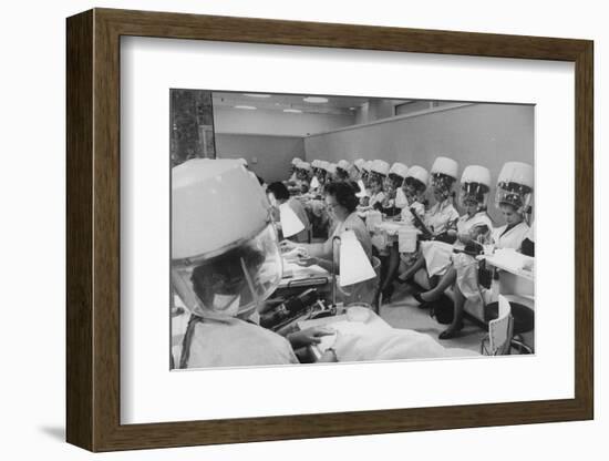 Women under Hair Dryers Getting Hair Styled in Beauty Salon at Saks Fifth Ave. Department Store-Alfred Eisenstaedt-Framed Photographic Print