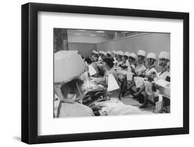 Women under Hair Dryers Getting Hair Styled in Beauty Salon at Saks Fifth Ave. Department Store-Alfred Eisenstaedt-Framed Photographic Print