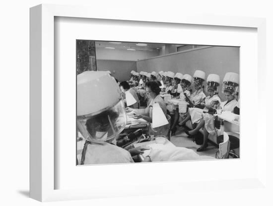 Women under Hair Dryers Getting Hair Styled in Beauty Salon at Saks Fifth Ave. Department Store-Alfred Eisenstaedt-Framed Photographic Print