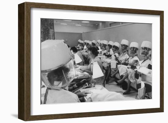 Women under Hair Dryers Getting Hair Styled in Beauty Salon at Saks Fifth Ave. Department Store-Alfred Eisenstaedt-Framed Photographic Print