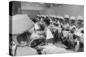 Women under Hair Dryers Getting Hair Styled in Beauty Salon at Saks Fifth Ave. Department Store-Alfred Eisenstaedt-Stretched Canvas