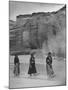 Women Wading in the "De Chelly Canyon" in Native Dress-null-Mounted Photographic Print