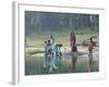 Women Washing Clothes on the Ghats of the River Mahanadi, Reflected in the Water, Orissa, Inda-Annie Owen-Framed Photographic Print