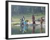 Women Washing Clothes on the Ghats of the River Mahanadi, Reflected in the Water, Orissa, Inda-Annie Owen-Framed Photographic Print
