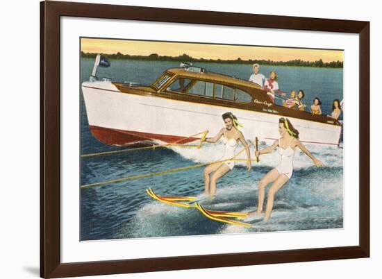 Women Waterskiing by Motorboat-null-Framed Art Print