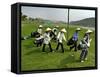 Women Wearing the Traditional Vietnamese Conical Hats Haul Golf Clubs-null-Framed Stretched Canvas