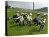 Women Wearing the Traditional Vietnamese Conical Hats Haul Golf Clubs-null-Stretched Canvas