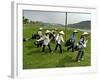 Women Wearing the Traditional Vietnamese Conical Hats Haul Golf Clubs-null-Framed Photographic Print