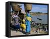 Women with Baskets of Laundry on Their Heads Beside the River, Djenne, Mali, Africa-Bruno Morandi-Framed Stretched Canvas