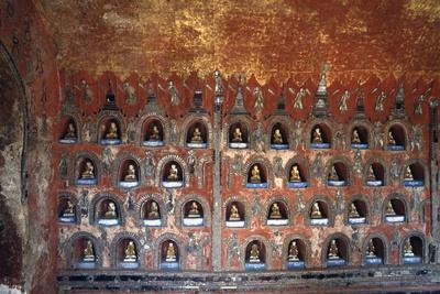 https://imgc.allpostersimages.com/img/posters/wood-panel-with-niches-containing-statues-of-buddha_u-L-PV1D320.jpg?artPerspective=n