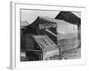 Wooden and Tin Shack with Canvas Roof Housing, Mary Ely Restaurant, Bar B Q Today, in Oil Boomtown-Carl Mydans-Framed Photographic Print