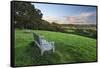 Wooden bench looking over green field countryside of High Weald on summer evening, Burwash-Stuart Black-Framed Stretched Canvas