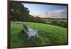 Wooden bench looking over green field countryside of High Weald on summer evening, Burwash-Stuart Black-Framed Premium Photographic Print