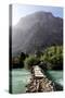 Wooden bridge over a river in the remote and spectacular Fann Mountains, Tajikistan-David Pickford-Stretched Canvas