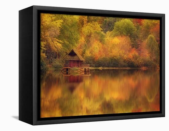 Wooden Cabin on Lake in Autumn-Robert Llewellyn-Framed Stretched Canvas