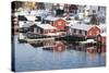 Wooden Cabins at the Waters Edge in the Town of Raine in the Lofoten Islands, Arctic, Norway-David Clapp-Stretched Canvas