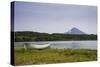 Wooden Canoe in Front of the Ilyinsky (Volcano) and Kurile Lake, Kamchatka, Russia, Eurasia-Michael Runkel-Stretched Canvas