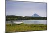 Wooden Canoe in Front of the Ilyinsky (Volcano) and Kurile Lake, Kamchatka, Russia, Eurasia-Michael Runkel-Mounted Photographic Print