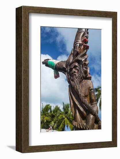 Wooden carvings on the Monument des Dix-Neuf (Monument of 19), Ouvea, Loyalty Islands, New Caledoni-Michael Runkel-Framed Photographic Print