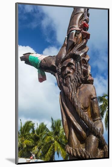 Wooden carvings on the Monument des Dix-Neuf (Monument of 19), Ouvea, Loyalty Islands, New Caledoni-Michael Runkel-Mounted Photographic Print