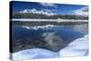 Wooden Chalet Surrounded by Snowy Peaks and Woods Reflected in Lake Palu, Valtellina, Italy-Roberto Moiola-Stretched Canvas